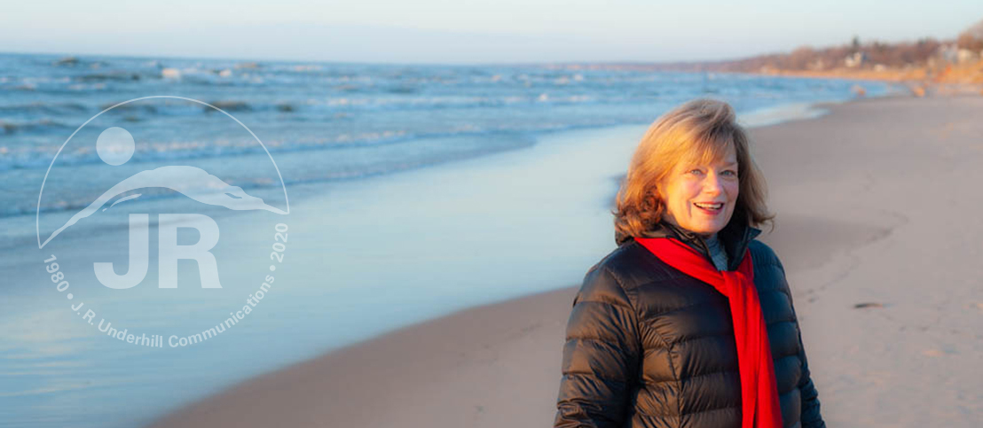 Photo of Jan Underhill on the beach at South Haven, Michigan